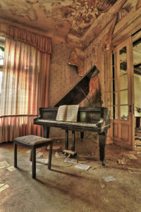 old piano in an abandoned house old piano in an abandoned house